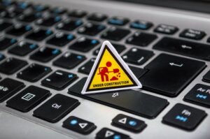 Photo by Fernando Arcos: https://www.pexels.com/photo/under-construction-signage-on-laptop-keyboard-211122/